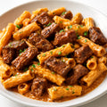 Cajun style beef pasta dish recipe created by pantribot using RolTak AI